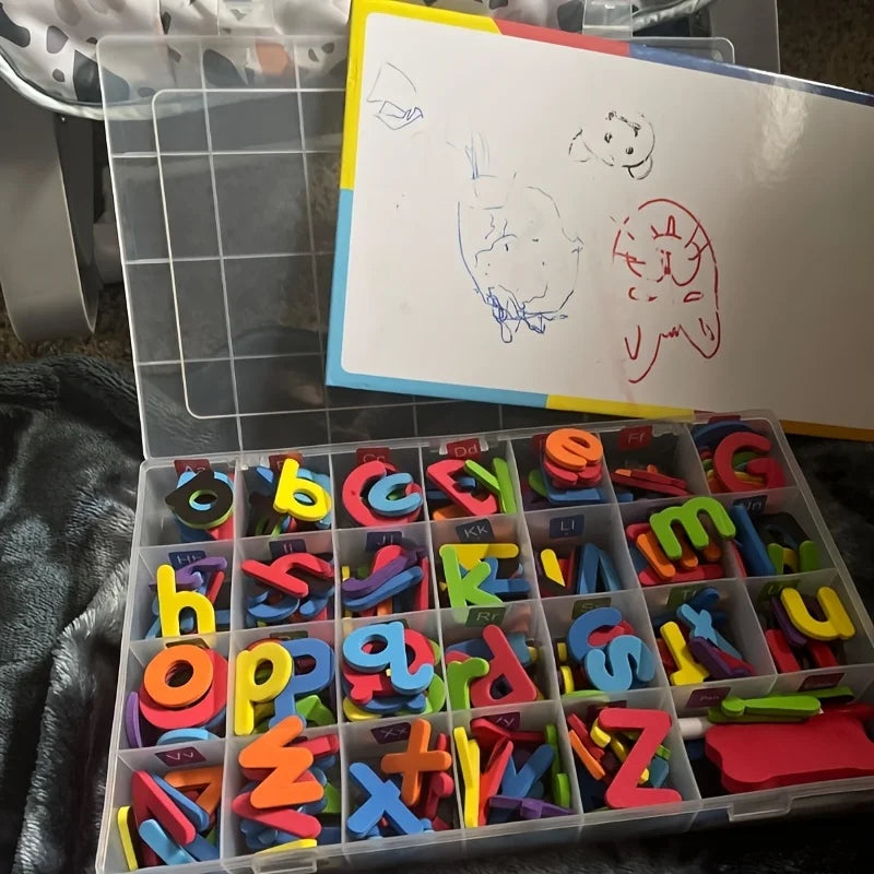 A clear plastic box filled with colorful magnetic letters for educational learning.