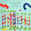 A set of various shape tracks and colorful building blocks for kids to create a marble run