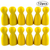 A set of twelve yellow wooden game pawns.
