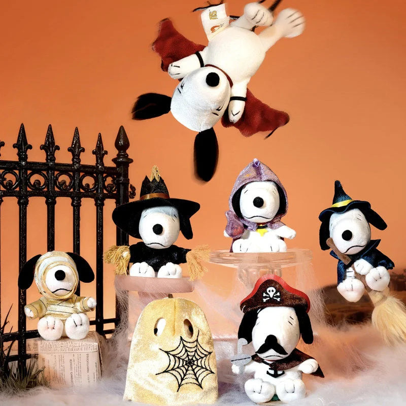 A collection of Snoopy Mischief Party Series collectible figures in various poses and colors displayed on a dark fence.