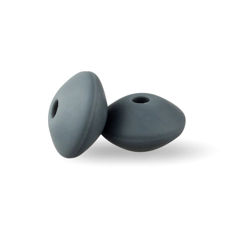 Two smooth, dark gray silicone lentil beads shaped like an abacus for jewelry making