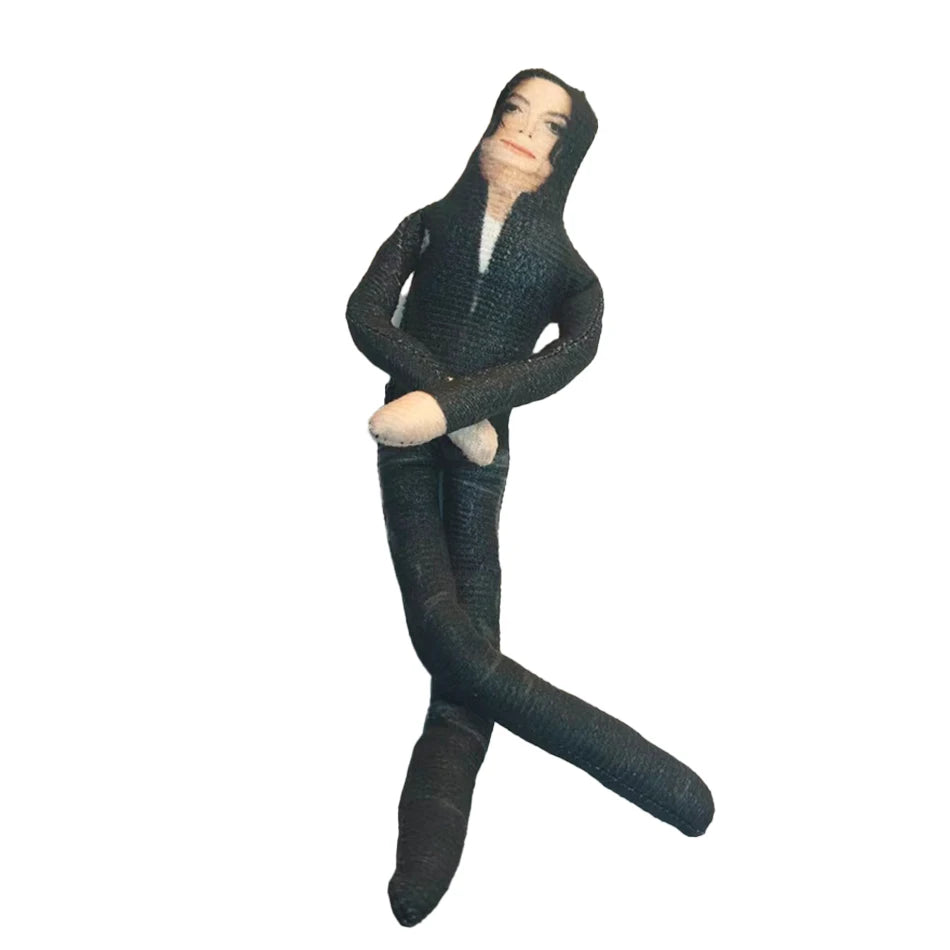 A plush doll resembling Michael Jackson with bendable limbs.