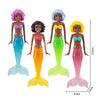 A set of four mermaid dive toys in various colors including purple, black, orange, and pink.