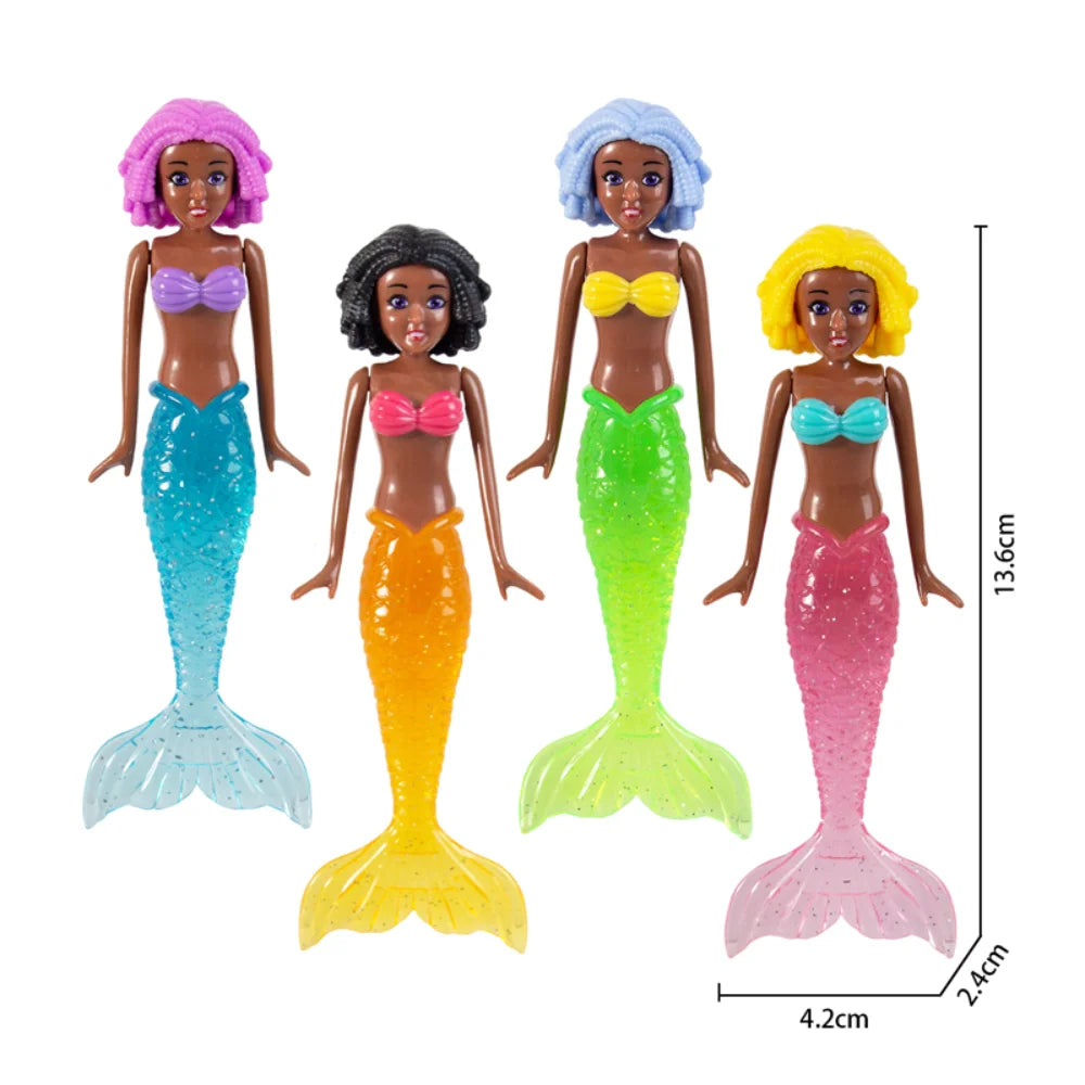 A set of four mermaid dive toys in various colors including purple, black, orange, and pink.