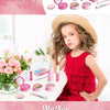 A collection of pink and purple makeup products including lip glosses, eyeshadow palettes, and brushes for a kids pretend pla