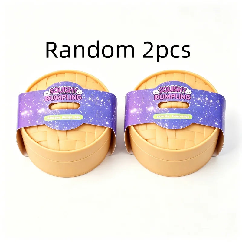 Two random squishy dumpling stress relief toys in purple and yellow packaging