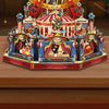 A detailed wooden model kit of a Ferris wheel and surrounding structures featuring figures and architecture.