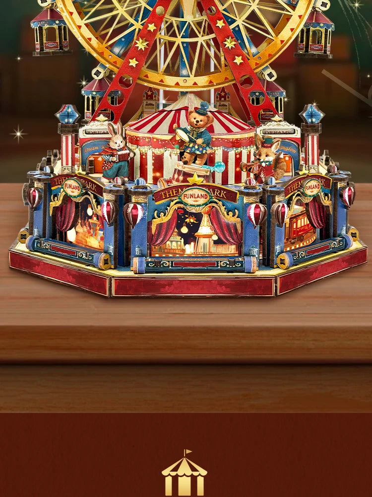 A detailed wooden model kit of a Ferris wheel and surrounding structures featuring figures and architecture.
