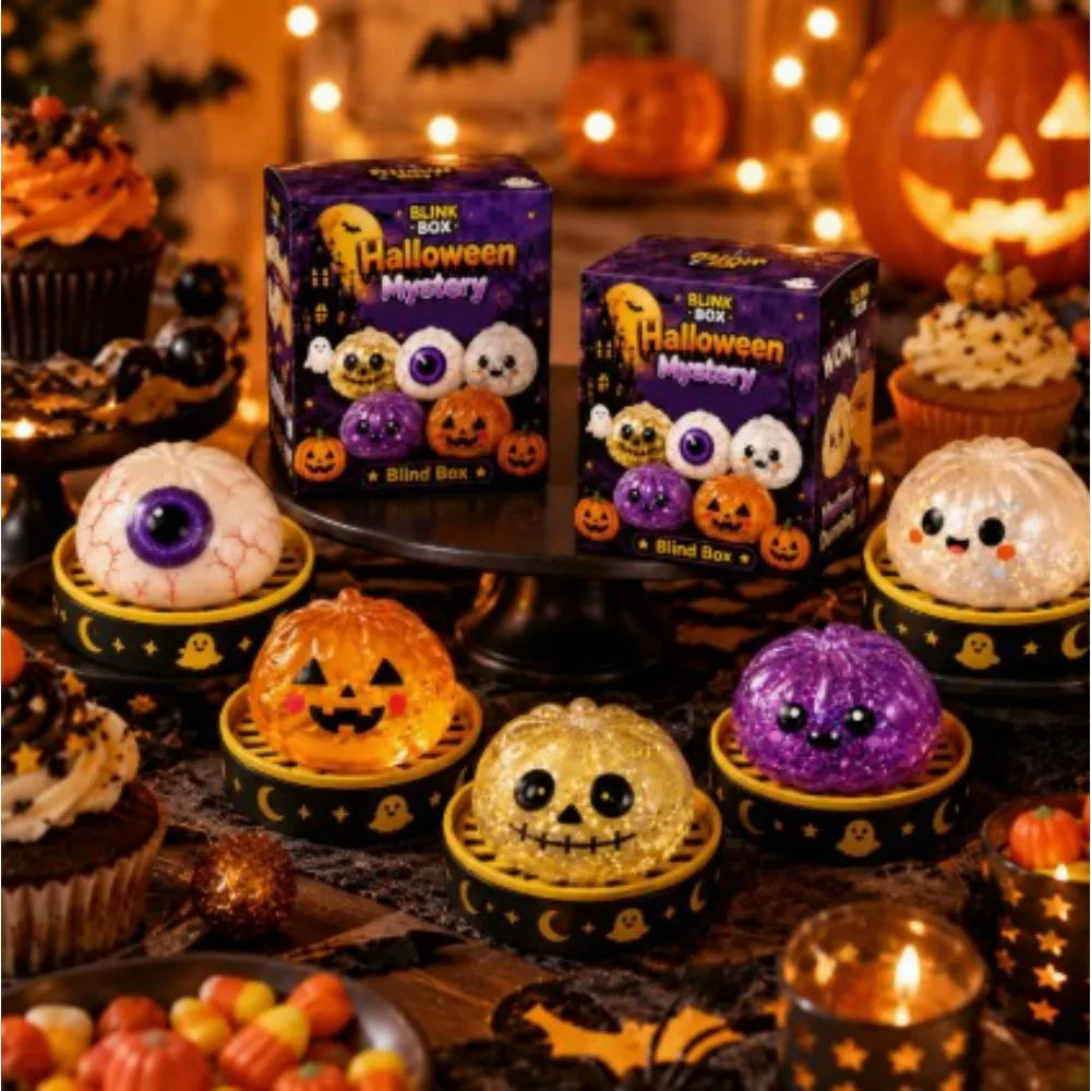 A collection of Halloween-themed squishy stress relief toys including boxes, pumpkins, and decorative items.