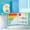 A box of fraction game learning toys featuring a cartoon rabbit and colorful tiles displayed next to an open tile set.
