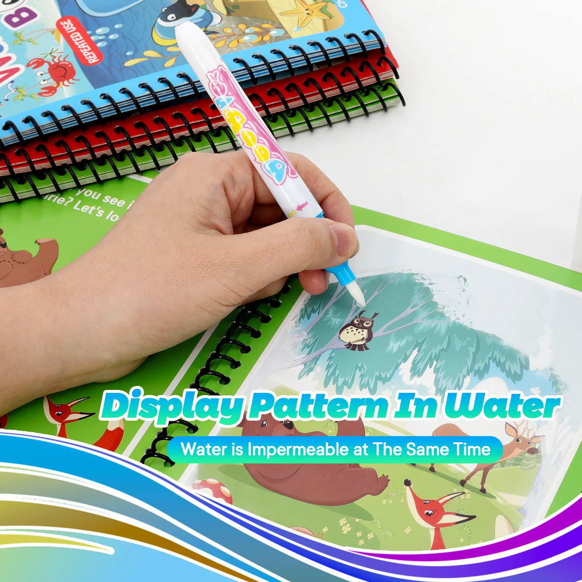A hand is painting a watercolor pattern in a book featuring dinosaur and animal themes on water-safe paper.