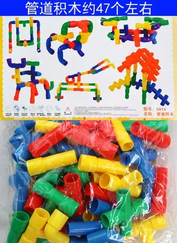 A collection of colorful plastic building blocks in various shapes and colors, including red, yellow, green, blue, and orange