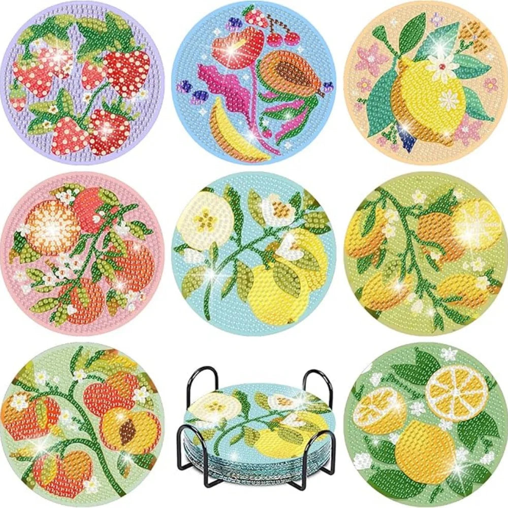 Set Diamantmaler Untersetzer mit Früchten und Blumen auf grünem Hintergrund