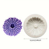 Purple floral silicone mold with a textured surface and a light beige silicone mold.