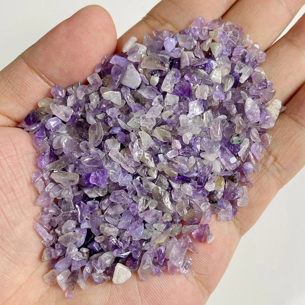 A handful of purple and translucent quartz stone chips for jewelry making and home decor