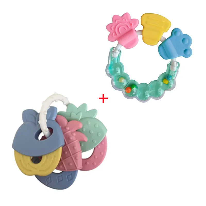 A set of silicone baby teethers in various colors including pink, yellow, blue, and green.