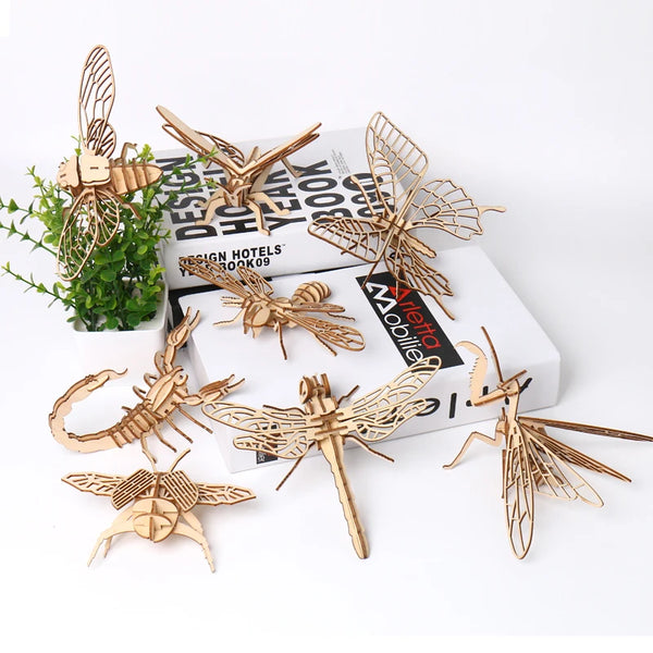 Colección de kits de rompecabezas 3D de insectos de madera, incluyendo una mariposa, una abeja y un escorpión, sobre fondo bl
