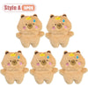 Five cute tan capybara plush keychains or bag charms
