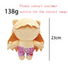 A light tan plush doll with peach-colored hair and pink patterned shorts, measuring 23cm.
