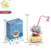 A set of 72 flower succulent building blocks for desktop plant decor, including a pink watering tool.