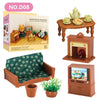 A miniature dollhouse furniture set featuring a wooden stove, a small cabinet, and a green upholstered chair.