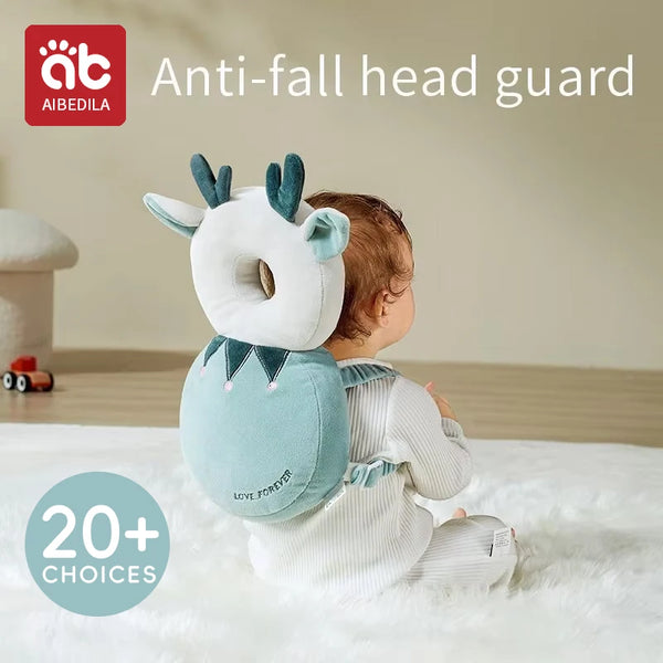 A baby is shown wearing a soft silicone anti-fall head guard pillow for protection.