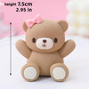 A cute, light brown bear-shaped cake topper with pink accents, measuring 7.5 cm (2.95 in).
