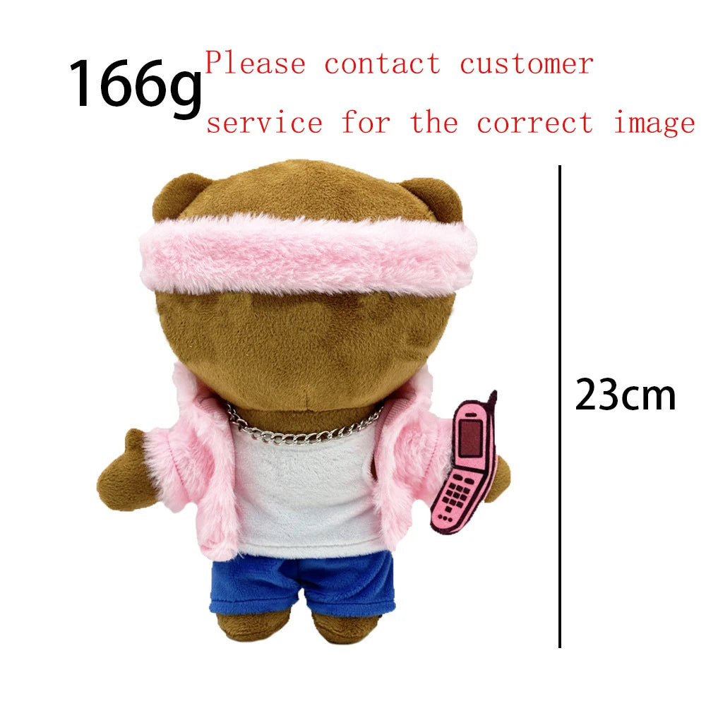 A plush doll resembling Eminem, XXXTentacion & Frank Ocean with pink hair and a pink jacket.
