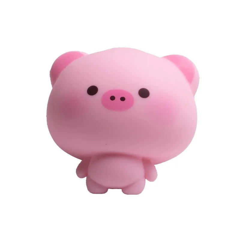 A pink squishy stress relief toy shaped like a cute pig.
