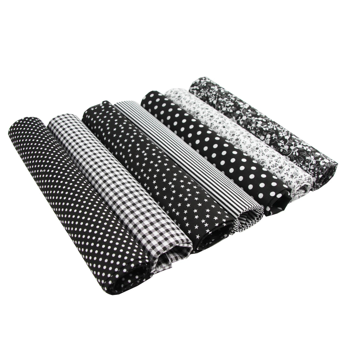 A pack of seven cotton fabric squares for quilting and patchwork in various patterns including polka dots, stripes, and stars