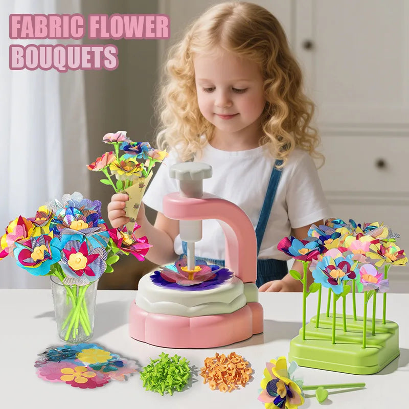 A young girl is holding a pink fabric flower bouquet kit with various colorful fabric flowers and green plant elements.