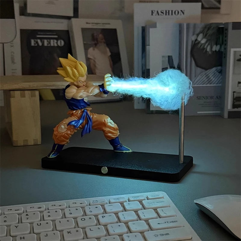 A figurine of Son Goku performing a Kamehameha pose, illuminated by a blue LED light.
