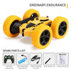 A yellow and black 4WD stunt car toy with large wheels and spare parts listed below.