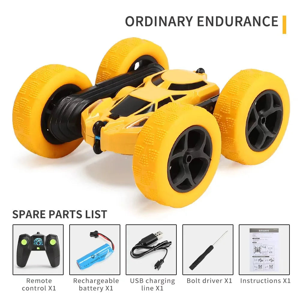 A yellow and black 4WD stunt car toy with large wheels and spare parts listed below.