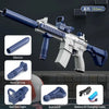 A blue and white water blaster rifle with a silencer, grip, red dot sight, buttstock, and battery charging cable.