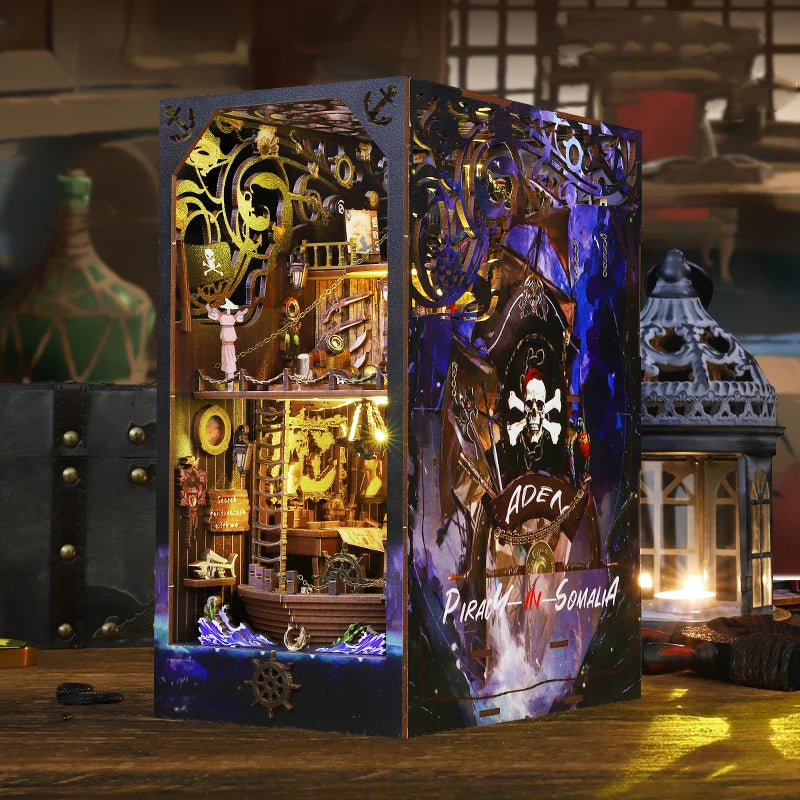 A detailed wooden pirate ship book nook kit featuring intricate carvings and a dark blue background.