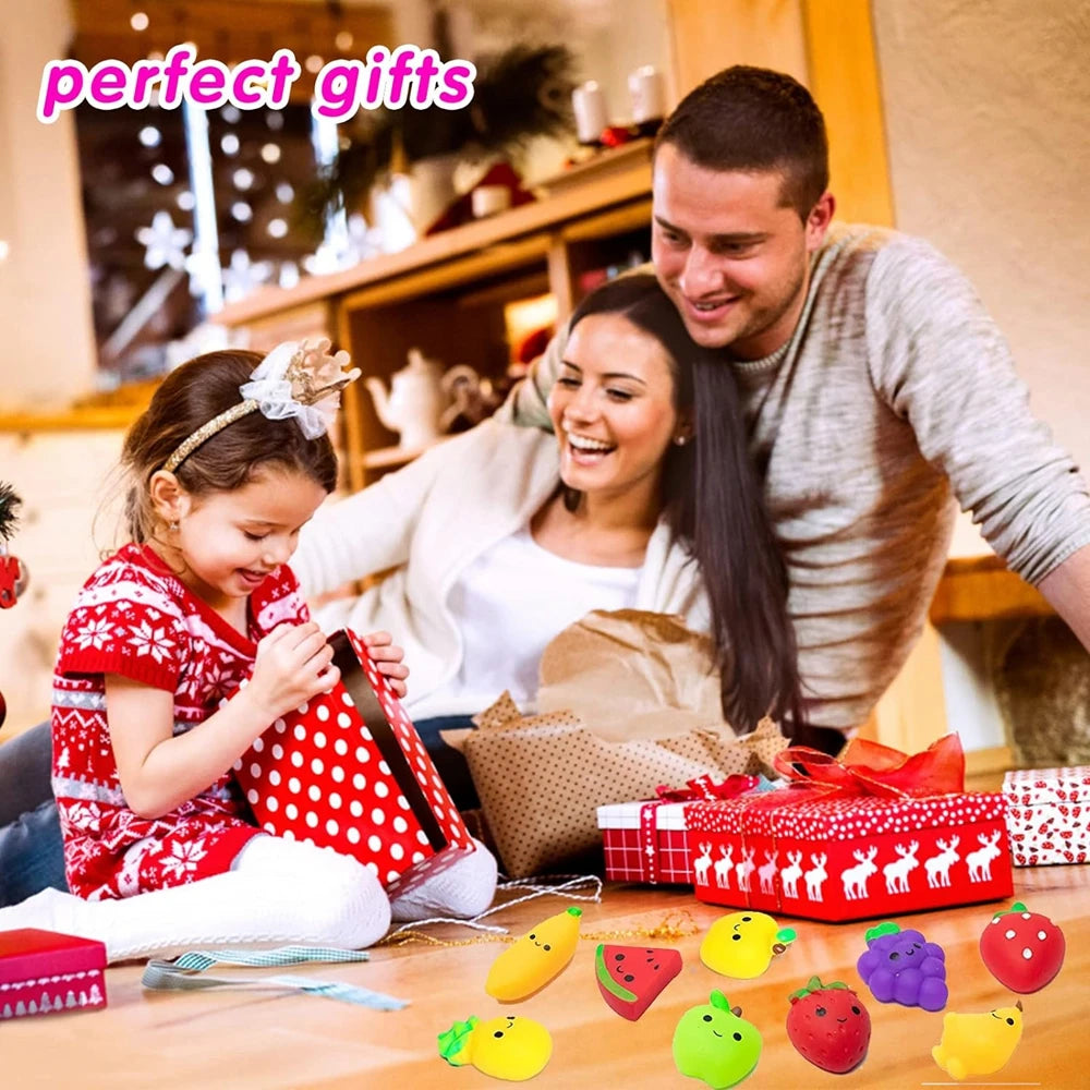 A family is shown with children and a man, surrounded by various colorful fruit and vegetable mochi squishies.
