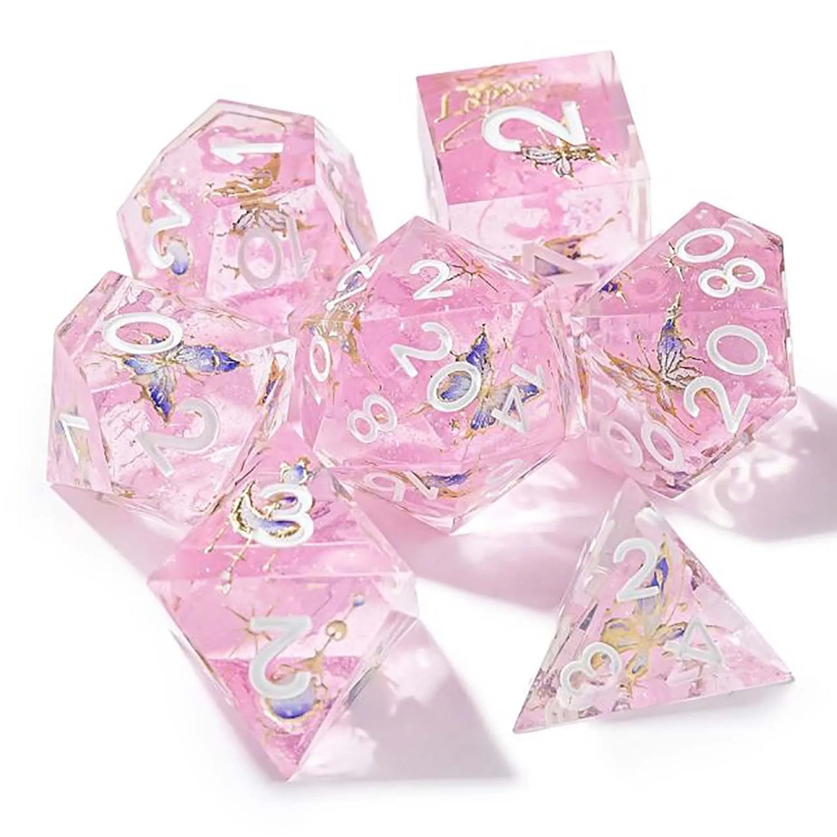 A set of seven pink floral butterfly resin polyhedral dice for tabletop role-playing games