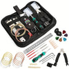 A black tool kit for guitar repair and maintenance, including various tools like picks, files, and tuning devices.