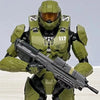 A 1/12 scale Master Chief action figure in olive green armor and helmet, holding an assault rifle.