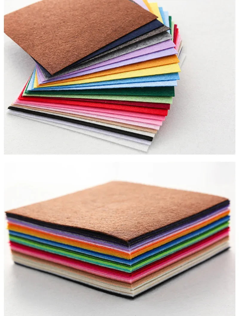 A stack of colorful non-woven felt fabric sheets in various shades of pink, red, green, yellow, and blue.