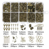 A collection of gold-colored jewelry making supplies including various beads, findings, and tools organized in a plastic case