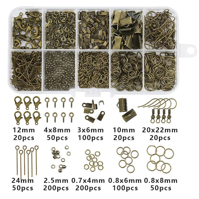 A collection of gold-colored jewelry making supplies including various beads, findings, and tools organized in a plastic case