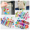A collection of colorful hexagonal silicone beads and jewelry findings for DIY crafting projects.