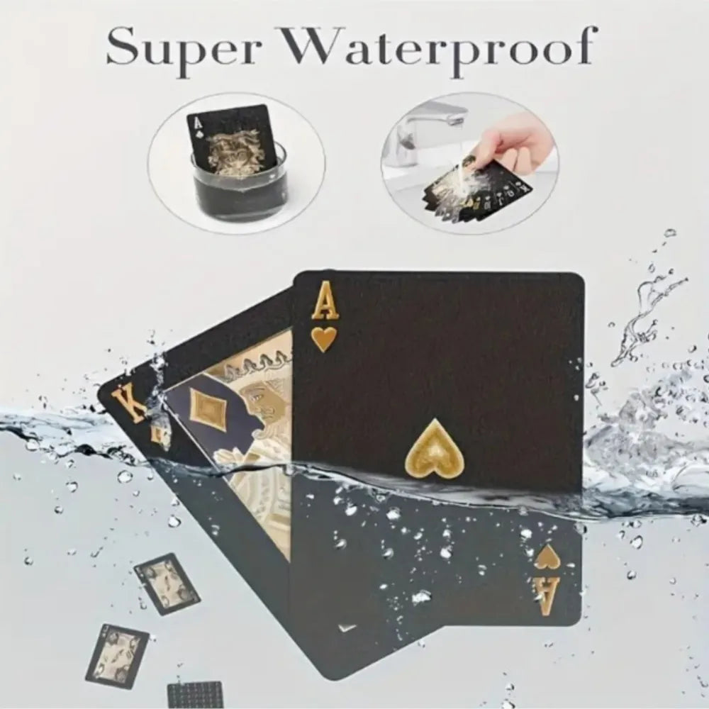 A set of black frosted poker playing cards with gold accents shown near water droplets.