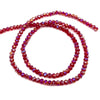 A strand of red faceted crystal beads used for jewelry making