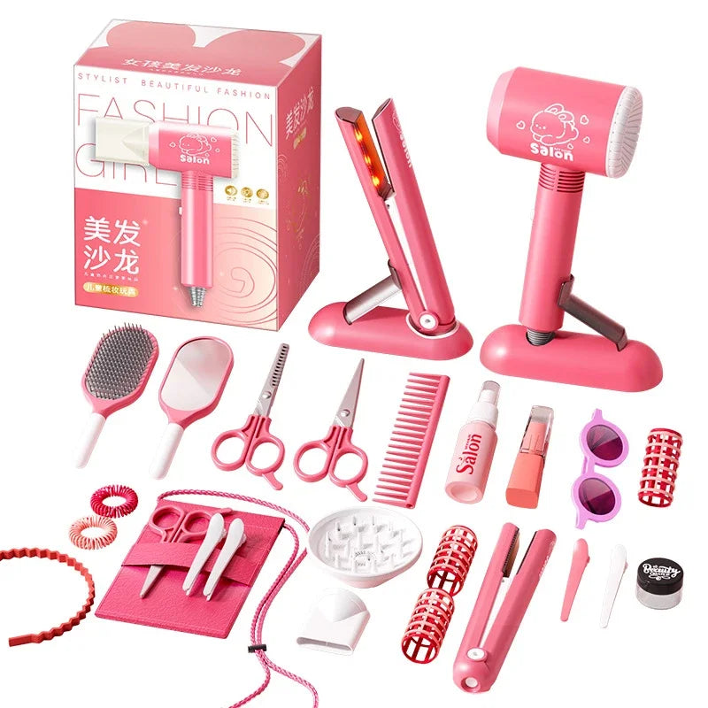 A pink kids hair salon role play set featuring various styling tools like a hairdryer, combs, and scissors.