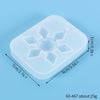 A translucent silicone mold with a square shape featuring multiple decorative indentations for jewelry and craft projects.