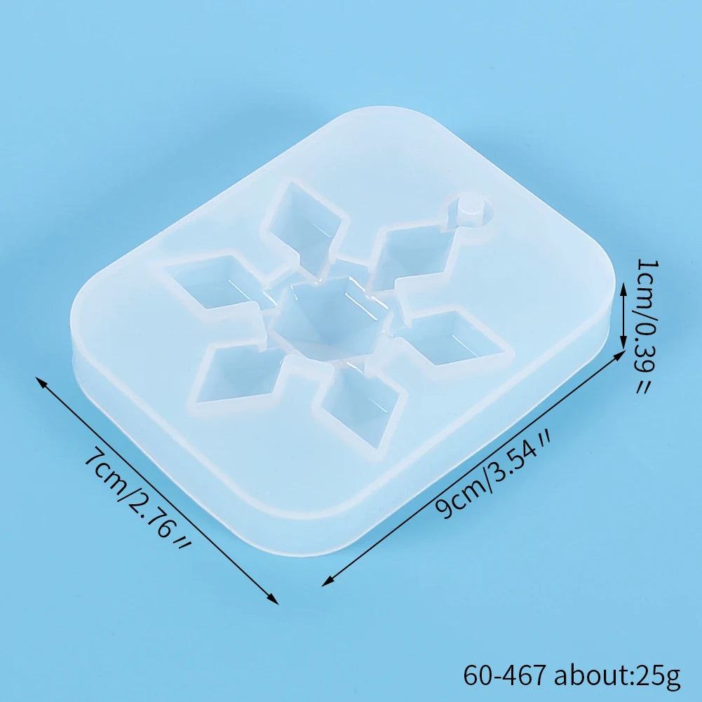 A translucent silicone mold with a square shape featuring multiple decorative indentations for jewelry and craft projects.