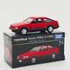 A red Toyota Corolla Levin die-cast model car in a box, featuring the Takara Tomy brand.